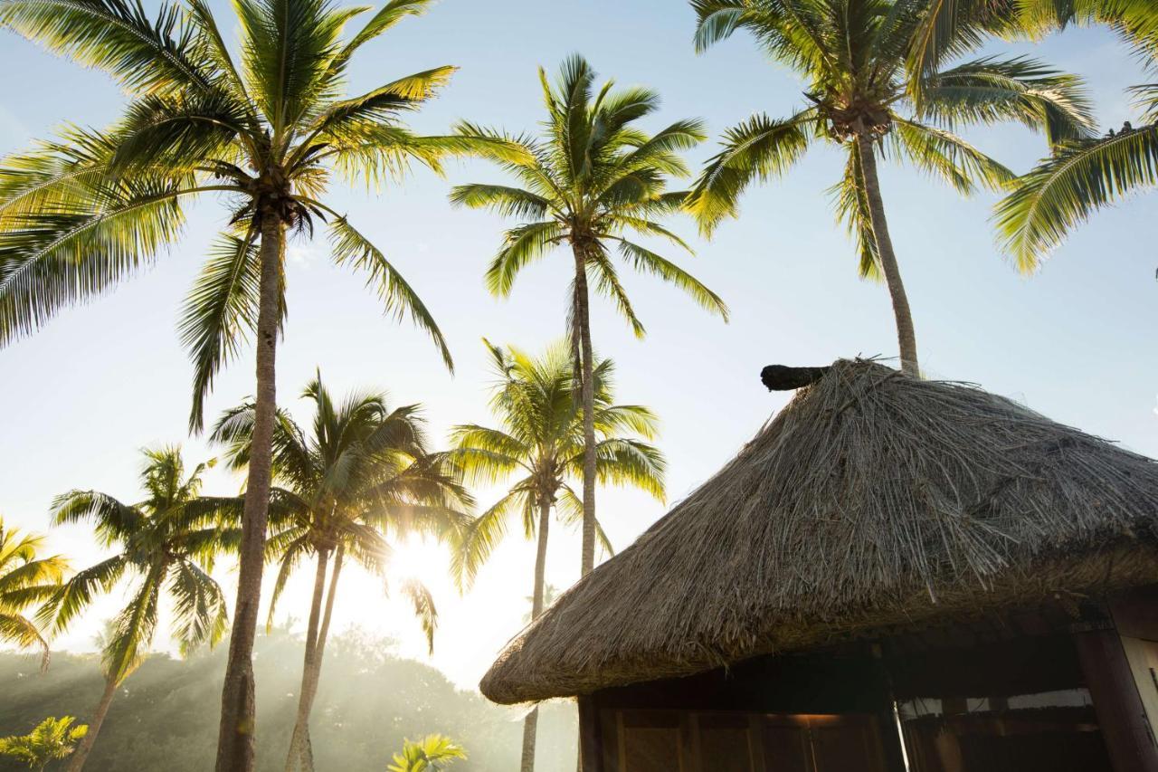 Outrigger Fiji Beach Resort Korotogo Luaran gambar A hut in the village of Avatele