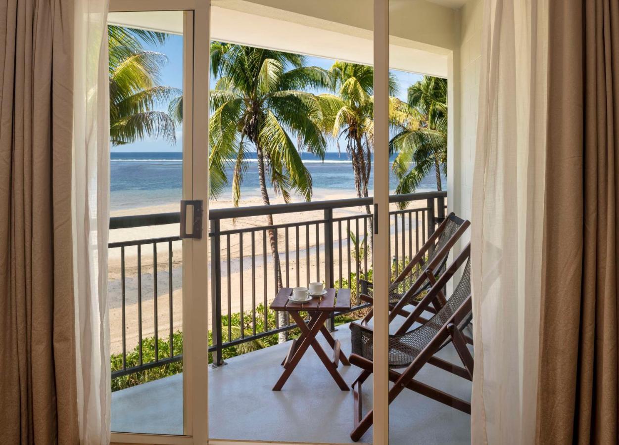 Outrigger Fiji Beach Resort Korotogo Luaran gambar A view of the beach from a room at the resort